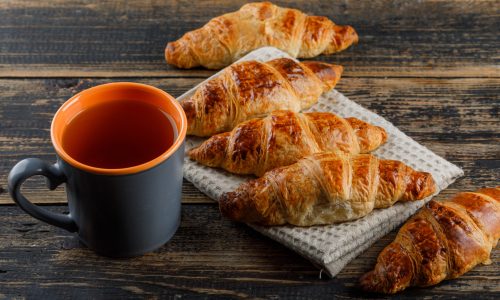 croissant-with-cup-tea-in-our-pastry-shop